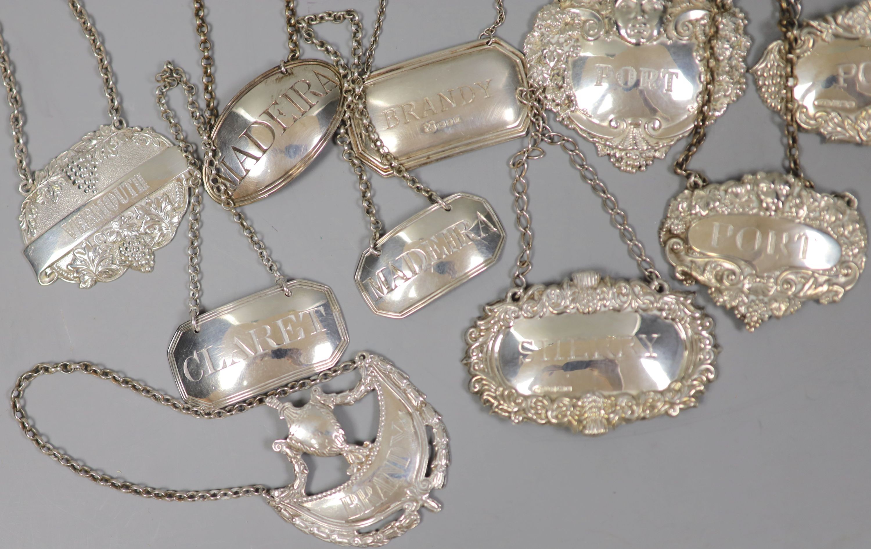 Three 19th century silver wine labels, Madeira(2) & Claret, six modern silver wine labels and three others.
